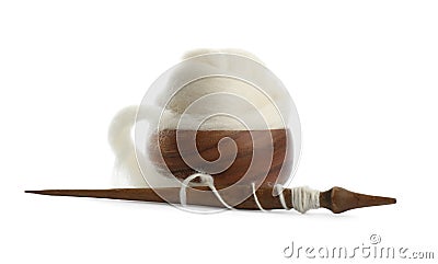 Ball of combed wool with wooden spindle and bowl isolated on white Stock Photo