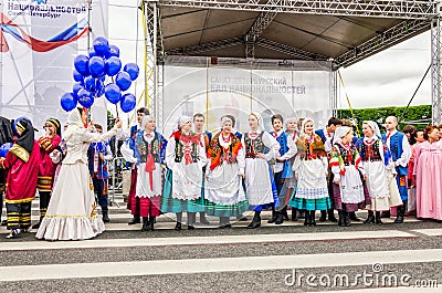 Ball of Nationalities festival participants the Polish folk dance ensemble GAIK. Opening parade. Editorial Stock Photo