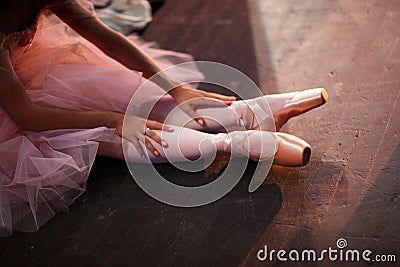 Ballerina in pointe shoes behind the scenes Stock Photo