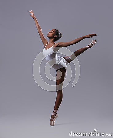 Ballerina in the pose `Swallow` Stock Photo