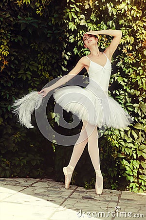 Ballerina sensually dances in nature. Stock Photo