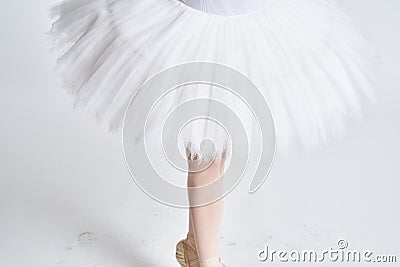 Ballerina white tutu dance exercise performance light background Stock Photo