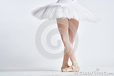 Ballerina white tutu dance exercise performance light background Stock Photo