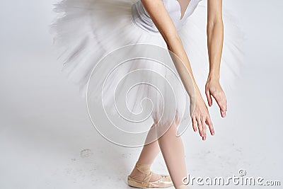 Ballerina white tutu dance exercise performance light background Stock Photo