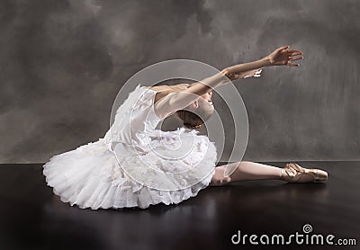 Ballerina in white tutu, leaning back like a swan Stock Photo