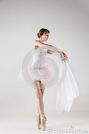 Ballet dancer in white tutu posing Stock Photo