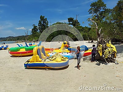 The balloon rides and rescue jackets on the elephant beach with a background of jungle Editorial Stock Photo