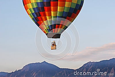 Balloon Rising in the Rockies Stock Photo