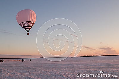a balloon at sunset in winter, in the north of Russia. Editorial Stock Photo