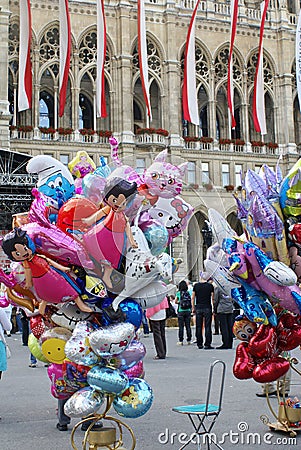 Balloon vendor in front of the rathaus in Vienna Editorial Stock Photo