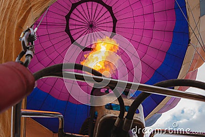 Balloon view from inside, fire from burner. A hot air balloon ride Stock Photo