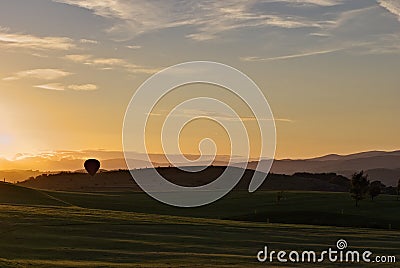 Ballooning at sunset Stock Photo