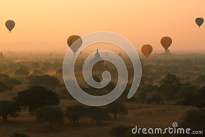 Balloons fly over thousand of temples in sunrise in Bagan, Myanmar Editorial Stock Photo