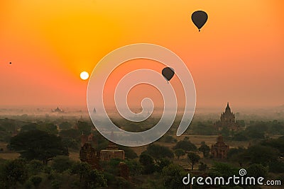 Balloons fly over thousand of temples in sunrise in Bagan, Myanmar Editorial Stock Photo