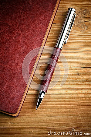 Ballpoint Pen and Notebook Stock Photo