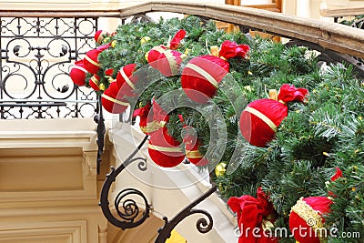 Balls, bags, toys on artificial branch of fir-tree Stock Photo