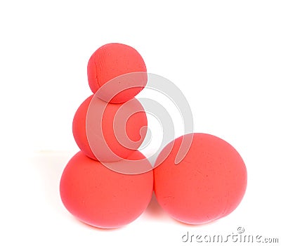 Balls of red modeling clay Stock Photo