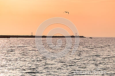 Baltic sunset. Amazing seascape colors. Dreams of travel and freedom. Sundown sky and claim weather Stock Photo