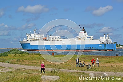 BALTIYSK, RUSSIA. The cargo sea railway and road ferry `Ambal` runs along the Baltic Strait. Russian text Editorial Stock Photo
