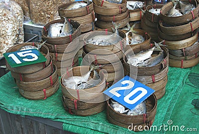 Decorative bamboo baskets with fresh fish, Asia Stock Photo