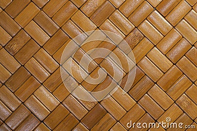 Bamboo brick mat texture. Brown tone bamboo placemat with a bricklike surface. Seamless wood pattern Stock Photo