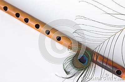 Bamboo flute, peacock feather