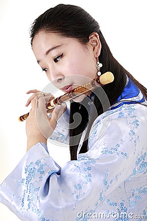 Bamboo flute performer Stock Photo