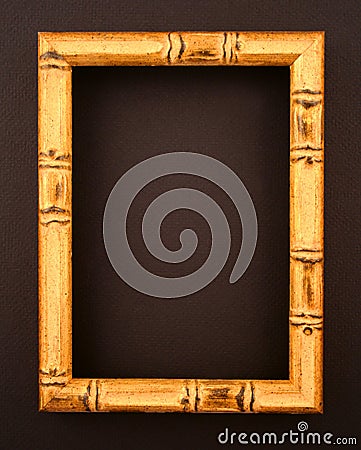 Bamboo frame on black surface Stock Photo