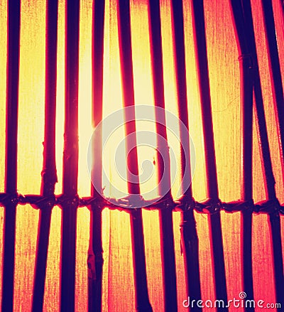 A bamboo lamp toned with a retro vintage instagram filter effect Stock Photo