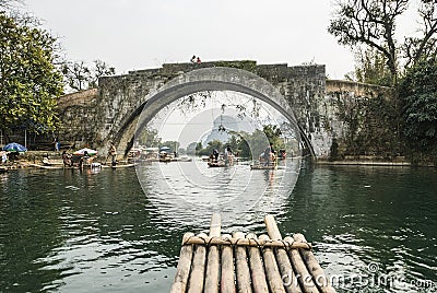 Bamboo rafting along Yulong River during the winter season with beauty of the landscape is a popular activity in Guilin. Editorial Stock Photo