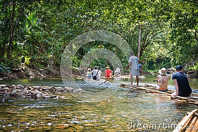 Bamboo rafting in green tropical scenery Editorial Stock Photo