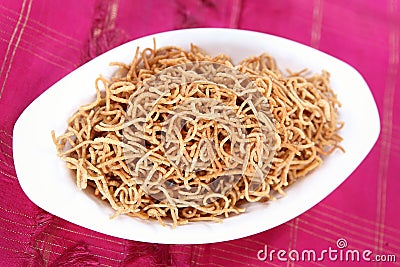 Bamboo rice crom seeds snack/ Moongil arisi Omapodi Stock Photo