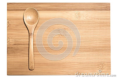 Bamboo spoon on the cutting board Stock Photo