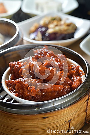 Steam soy sauce chicken feet chilly dim sum paws Stock Photo