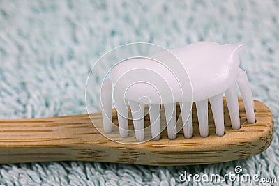 Bamboo toothbrush close up with homemade organic toothpaste Stock Photo