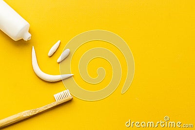 Bamboo toothbrush with toothpaste, overhead view.Dental hygiene concept Stock Photo