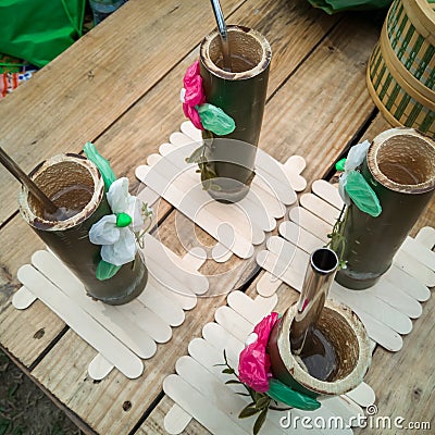 Bamboo Tubes and Metal Straws for Fresh Fruit Juice. Recycling, sustainable and natural concept Stock Photo