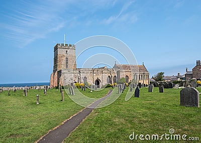 St Aidens Church and yard Bamburgh Editorial Stock Photo