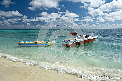 Banana boat ride on a Freeport beach, Grand Bahama Island Stock Photo