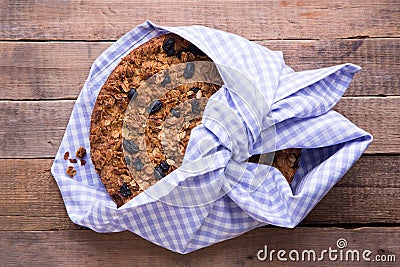 Banana cake with oatmeal and raisins granola top Stock Photo