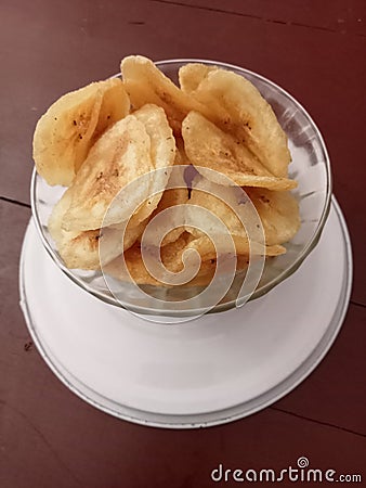 Banana crackers in a bowl Stock Photo