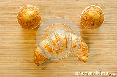 Banana cup cake and croissant Stock Photo