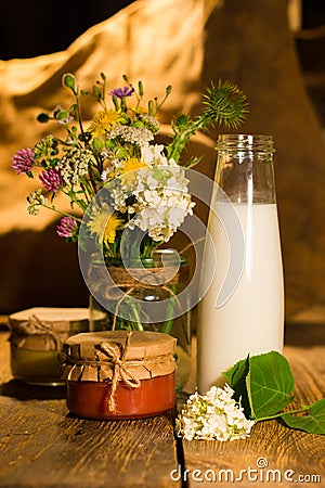 Banana and grapefruit jam in jars and milk in the bottle Stock Photo