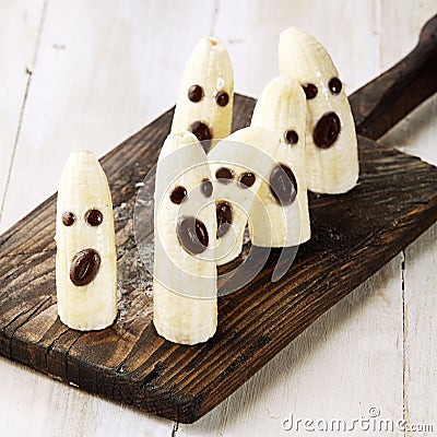 Banana Halloween Ghosts with Chocolate Faces Stock Photo