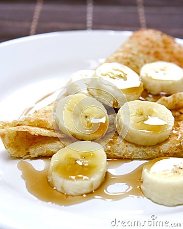 Banana and maple syrup pancake Stock Photo