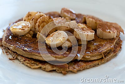 Banana and oat pancake with sliced bananas Stock Photo