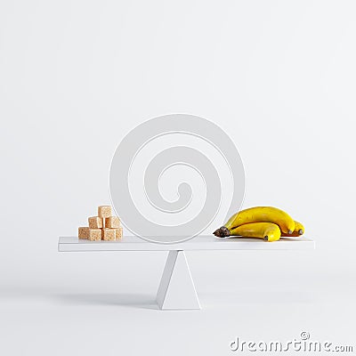 Banana sitting on seesaw with sugar cubes on white background Stock Photo