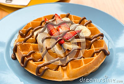 Banana Strawberry Nutella Belgium Waffle. Waffle for breakfast meal. Stock Photo