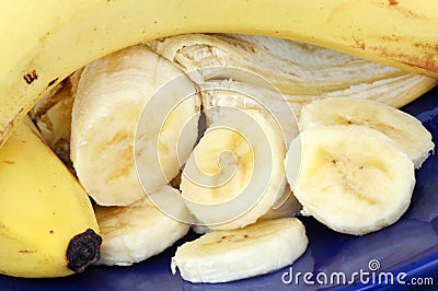 Banana, whole, peeled and slices Stock Photo