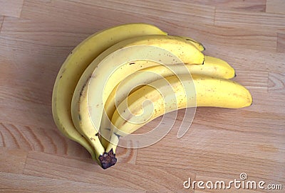 Bananas on wooden background close-up Stock Photo